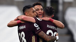 <p>Raphael Raphinha (left) celebrates Leeds’ opener (Stu Forster/PA)</p>