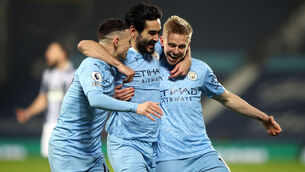 <p>Manchester City’s Ilkay Gundogan celebrates scoring their sides opening goal with Phil Foden (left) and Alexander Zinchenko at The Hawthorns. Picture: Nick Potts/PA Wire</p>