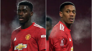 <p>Axel Tuanzebe and Anthony Martial (PA)</p>
