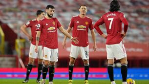 <p>Manchester United’s players appear dejected during their home defeat to Sheffield United (Dave Thompson/PA)</p>
