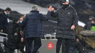 <p>Liverpool manager Jurgen Klopp, right, with Tottenham boss Jose Mourinho at the final whistle. 	Picture: Shaun Botterill/PA</p>