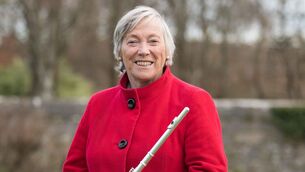 <p>Eanna Ní Lamhna with her flute in Kilrush, Co Clare. Picture: Eamon Ward</p>