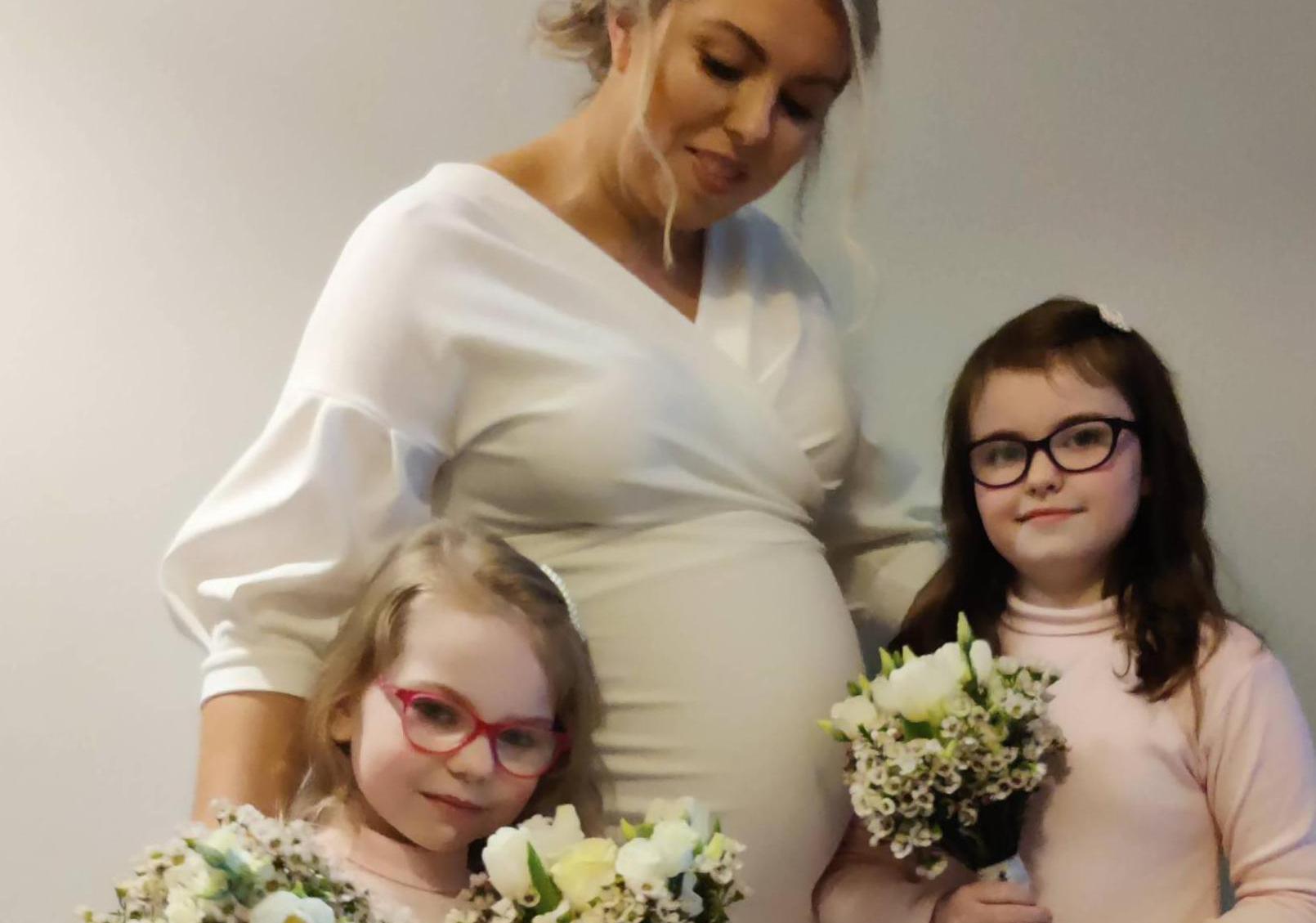Thirty-eight weeks' pregnant bride stunning in €19 wedding dress
