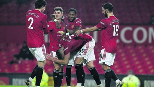 <p class="contextmenu internal_Caption">Scott McTominay celebrates with Manchester United team-matesafter scoring their sixth goal at Old Trafford tonight. <span class="contextmenu emphasis CaptionCredit">Picture: Phil Noble/Pool/Getty</span>
            </p>