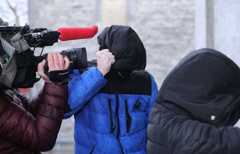 Patrick O'Brien (18) covers up as he arrives at Tralee District Court after pleading guilty to harassing former Arsenal striker Ian Wright on May 11, 2020. Photo: Niall Carson/PA Wire