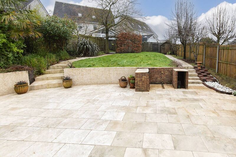 Marbella? The marble-finished patio and BBQ area, with tiled garden paths and pergola Marbella? The marble-finished patio and BBQ area, with tiled garden paths and pergola