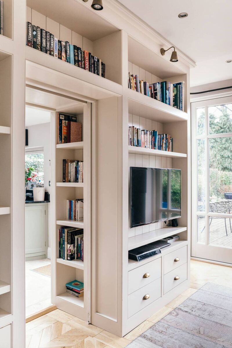 Clever use of built-in bespoke storage, by Interiors Atelier.