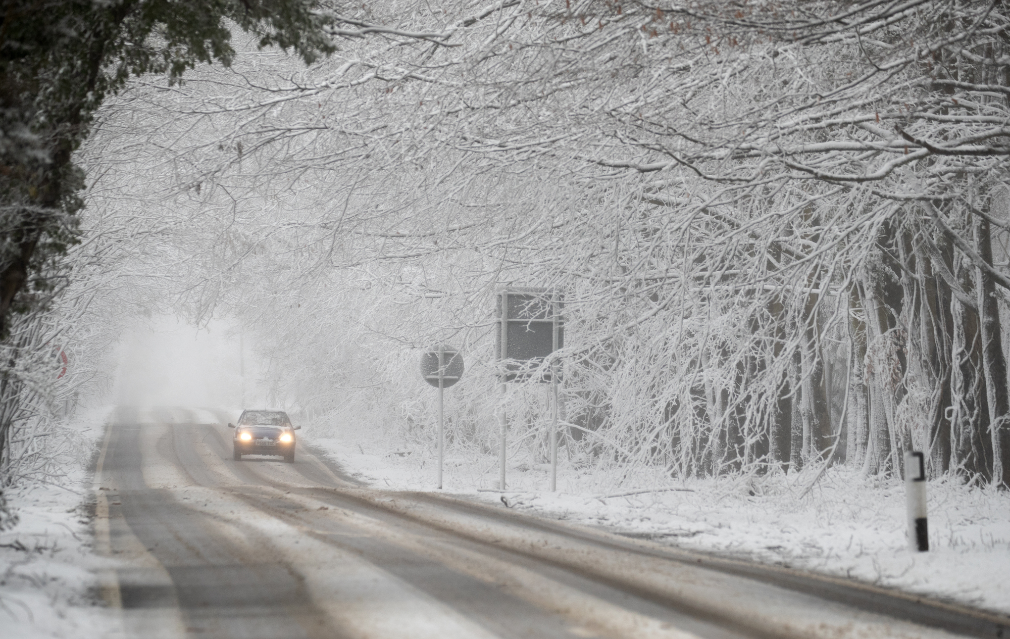 Heavy snow and strong winds hit parts of Britain