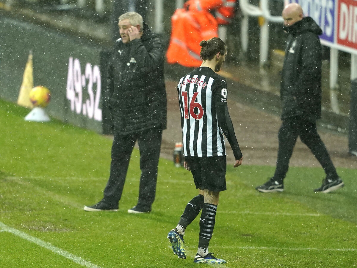HENDRICK HELL: Newcastle's Irish midfielder Jeff Hendrick walks off the pitch after being shown a second yellow card.
