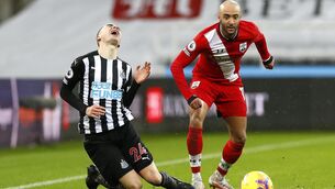 <p>SAINTS AND SINNERS: Newcastle's Paraguayan midfielder Miguel Almiron goes down under the challenge of Southampton's Nathan Redmond in the thriller at St James' Park. Steve Bruce's nine men hung on for a crucial three points.</p>