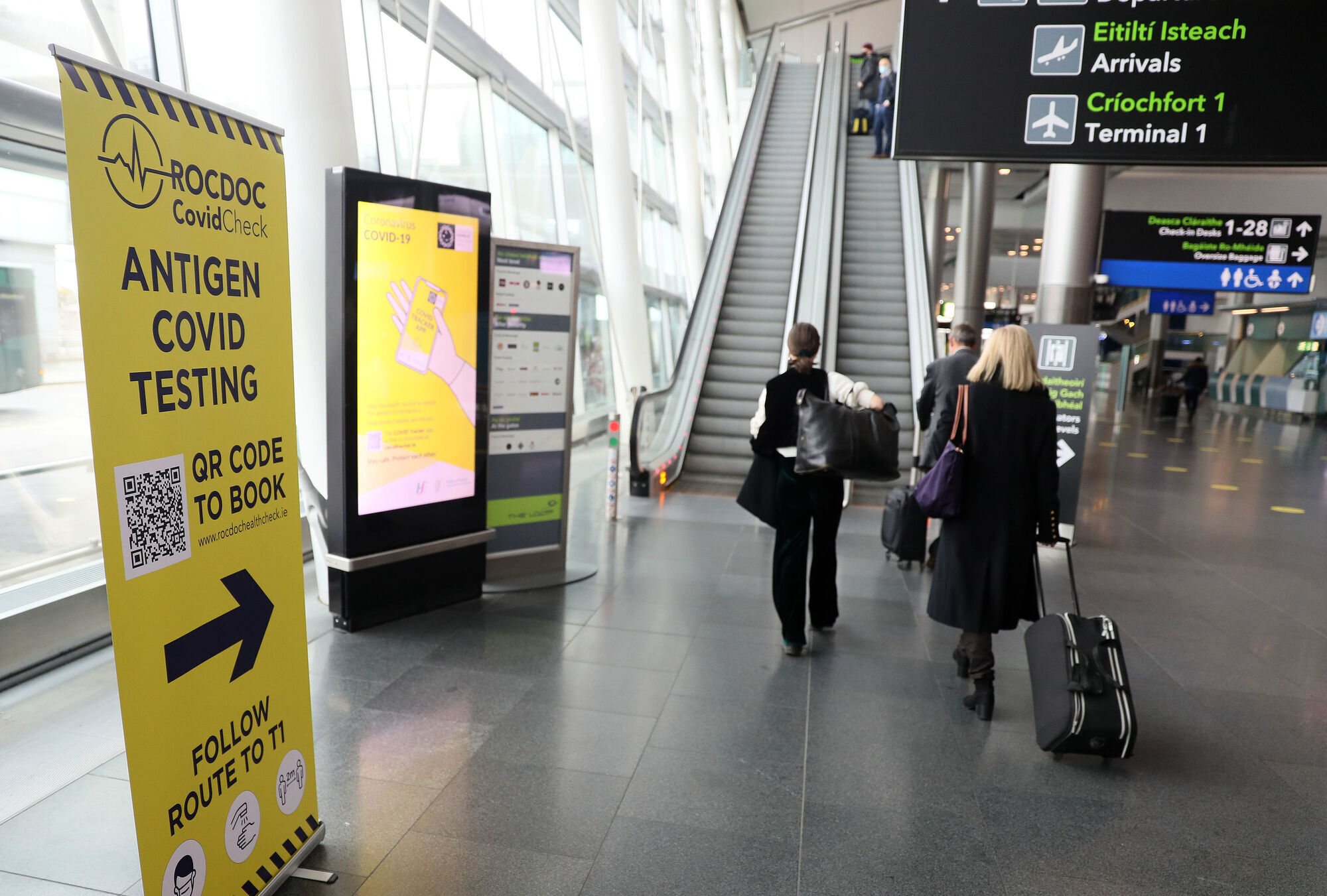 Signs for antigen covid testing at Terminal 2 at Dublin Airport. Picture: Brian Lawless/PA
