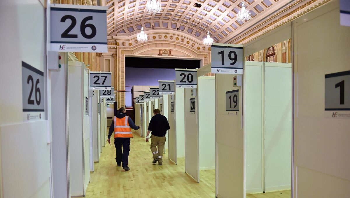 Workers setting up the mass vaccination clinic in the City Hall, Cork. Picture: Dan Linehan