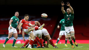 <p>Gareth Davies of Wales in action against Iain Henderson of Ireland during the Guinness Six Nations clash at the Principality Stadium. Picture: Gareth Everett/Sportsfile</p>