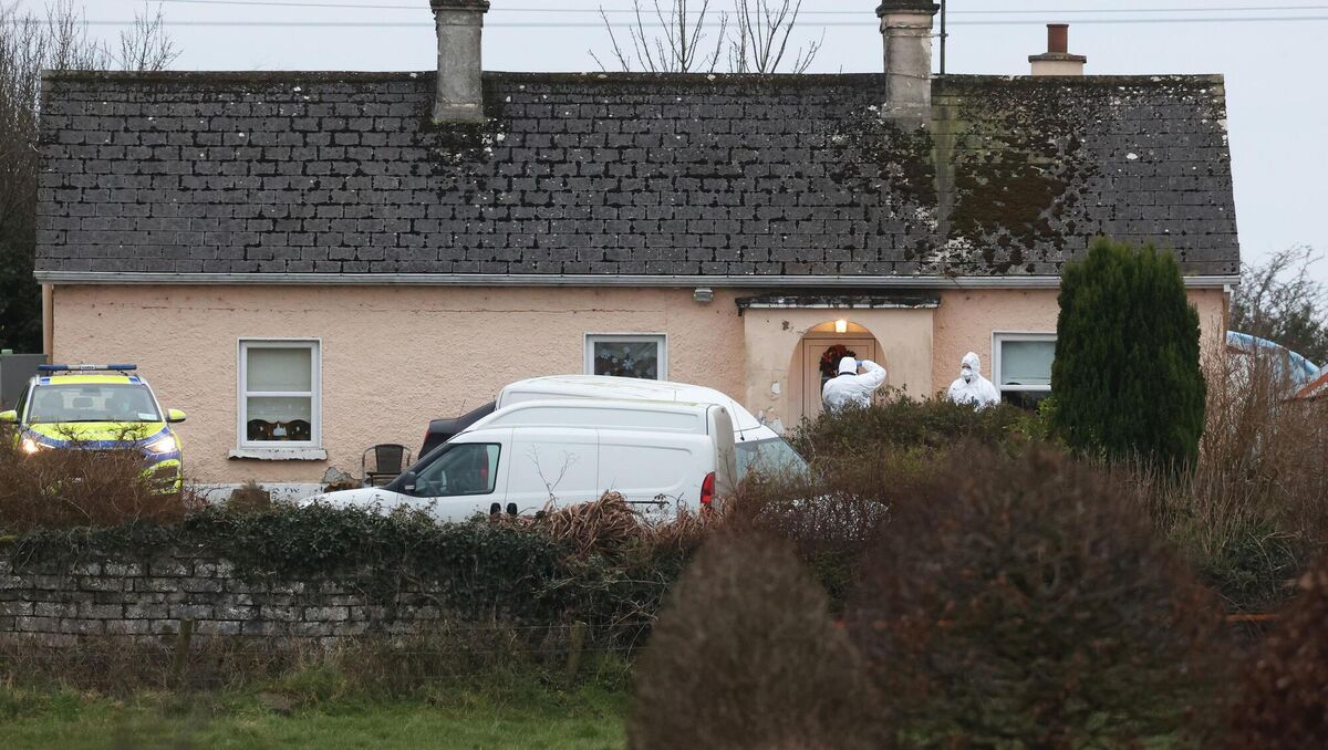 Garda forensic officers at a house in the Cloverhill area of Belturbet, Co Cavan, where the bodies of a man and a woman, both in their 40s, were discovered yesterday. 	Picture: Liam McBurney/PA Wire