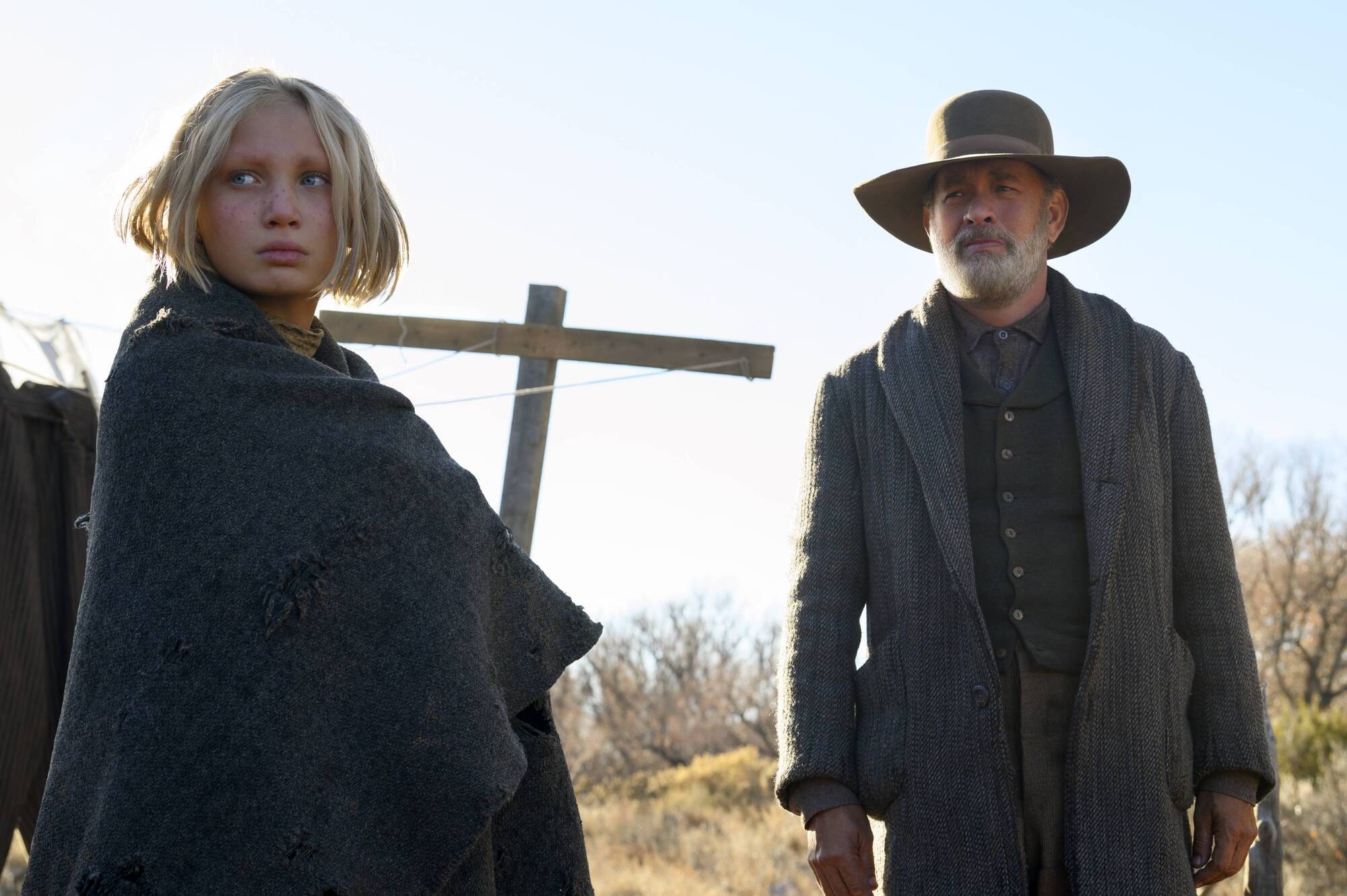 (from left) Johanna Leonberger (Helena Zengel) and Captain Jefferson Kyle Kidd (Tom Hanks) in News of the World, co-written and directed by Paul Greengrass. 