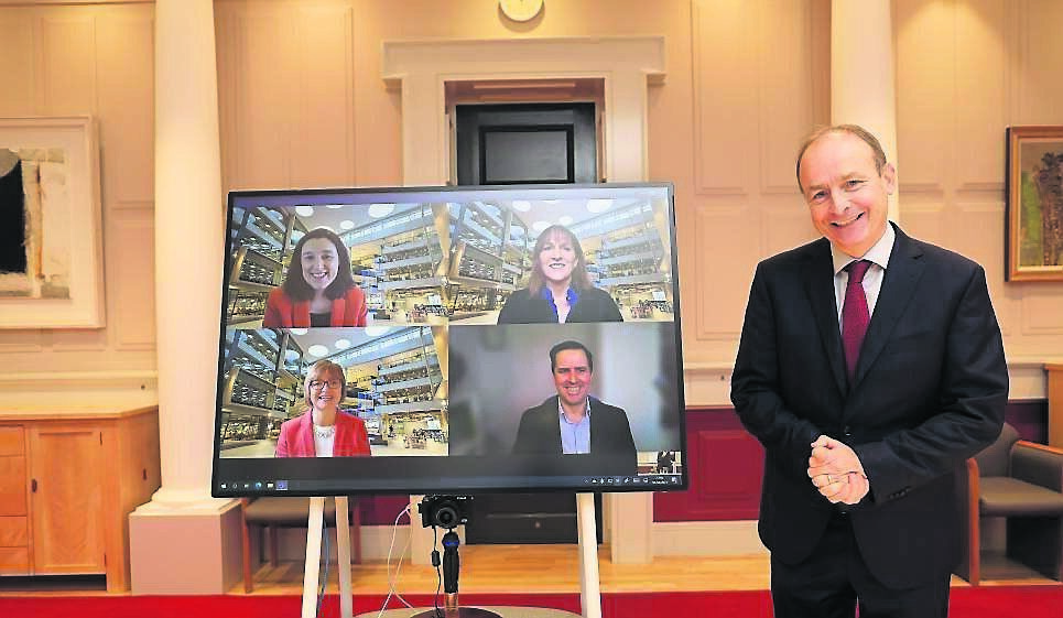 Taoiseach Micheál Martin annoncing Microsoft Ireland’s expansion of its Dublin-based EMEA digital sales team, with 200 new jobs; on screen are Cathriona Hallahan, MD of Microsoft Ireland; Lisa Dillon, vice-president, Microsoft EMEA Digital Sales; Joanne Morrissey, HR director, Microsoft Ireland.
