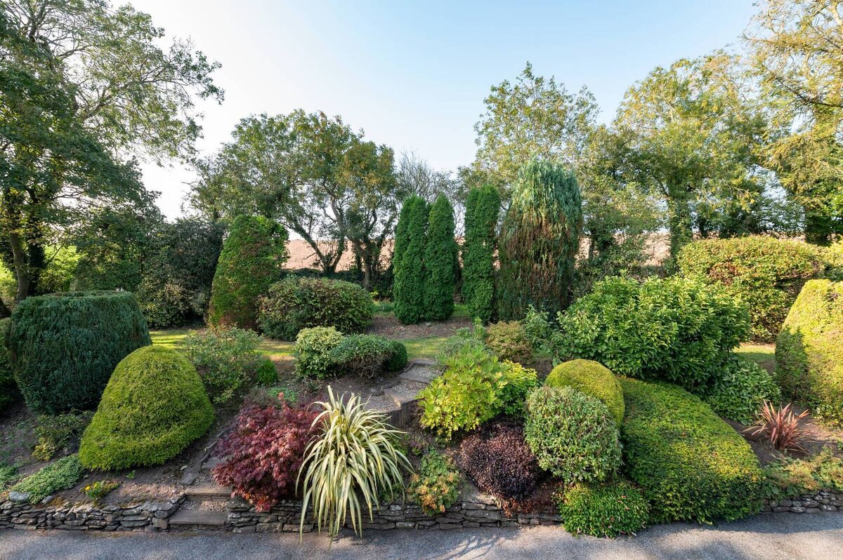 Gardens were laid out by Brian Cross