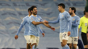 <p>Manchester City’s Ilkay Gundogan celebrates scoring. PIcture: Tim Keeton/PA</p>