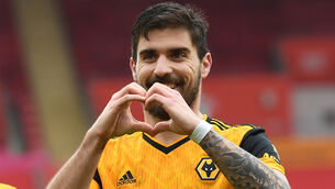 <p>Ruben Neves scored from the spot for Wolves (Andy Rain/PA)</p>