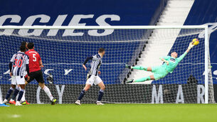 <p>West Bromwich Albion goalkeeper Sam Johnstone (right) saves a shot from Manchester United's Harry Maguire at The Hawthorns. Picture: Michael Steele/PA</p>