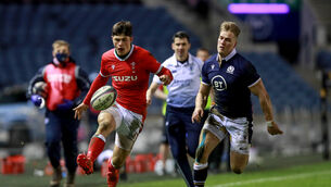 <p>Wales' Louis Rees-Zammit chases his own kick to score a try. Picture: INPHO/Tommy Dickson</p>
