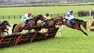 <p>Coltor and Paul Townend (right) beats Showbusiness (left) and Zoffanien (centre) to win the Naas Maiden Hurdle. Picture: Healy Racing</p>