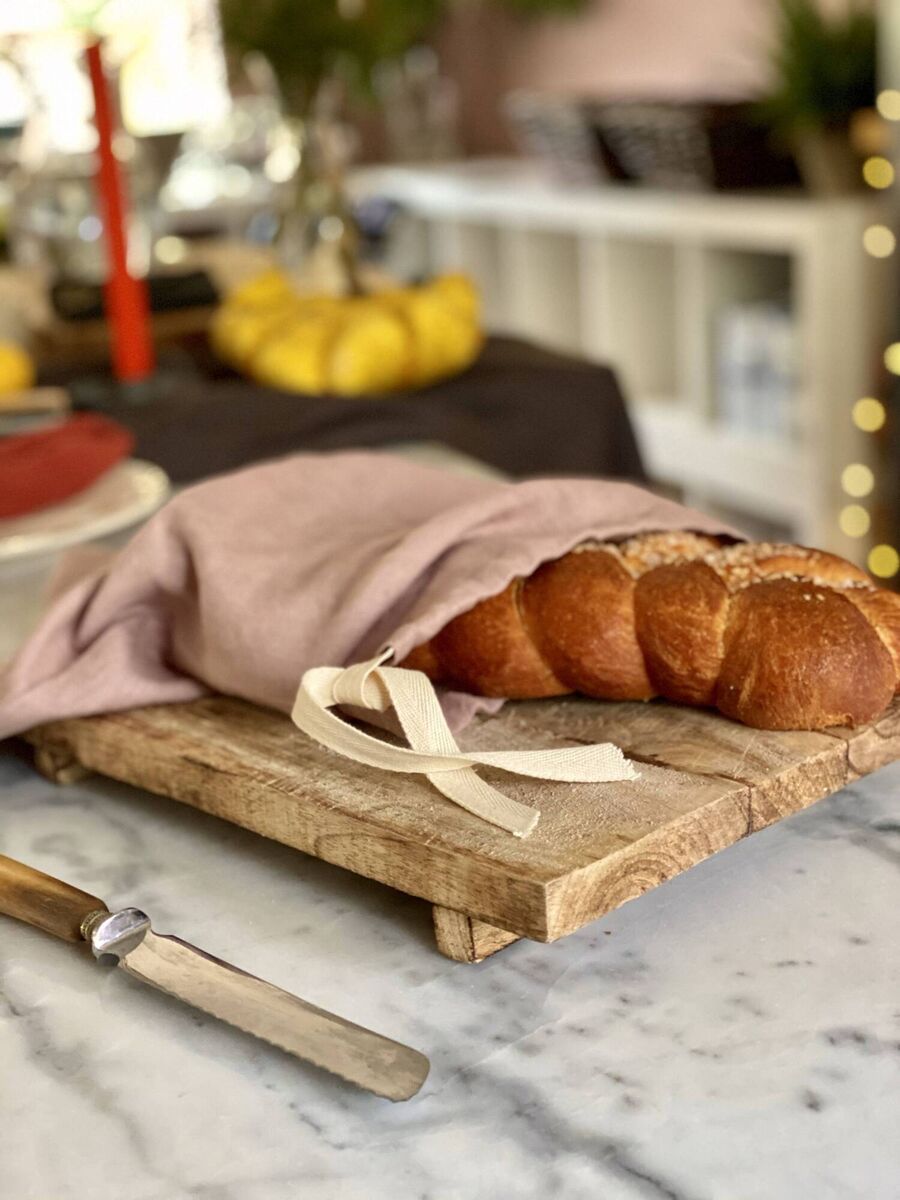 If you'd like to dispense with a bulky bread bin, try a bread bag instead. Clodagh's is made of linen and has a draw string to hang it up and save space.