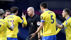 <p>Referee Lee Mason is surrounded at The Hawthorns (Peter Powell/PA)</p>