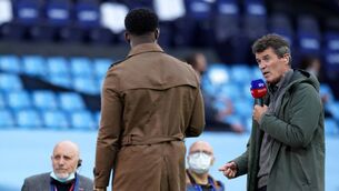 <p>Roy Keane (right) working for Sky Sports during a Premier League match at the Etihad Stadium, Manchester.</p>