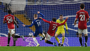 <p>Manchester United's Victor Lindelof makes a tackle to deny Chelsea's Timo Werner a chance on goal during the Premier League match. Picture: Andy Rain</p>