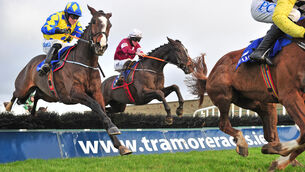 <p>Ennemi Public and Jack Kennedy (centre far) jumps the last in third but gets up to beat Mercury Lane (left) and Cavallino (right) to win The Irish Racing Industry Fundraiser Maiden Hurdle.</p>