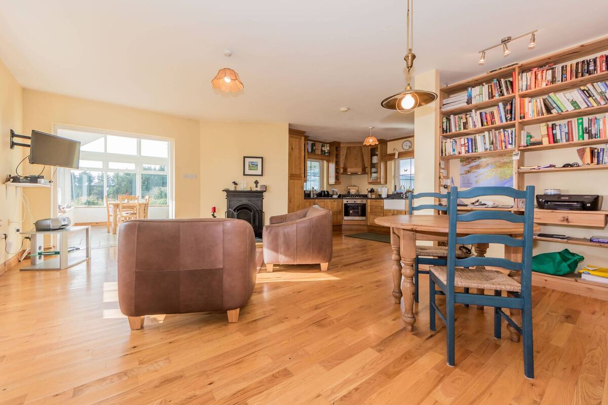 The open plan kitchen/living/dining room.