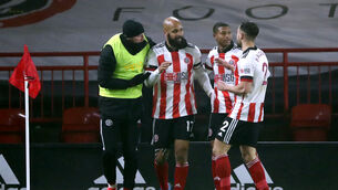 <p>Sheffield United's David McGoldrick (centre) celebrates scoring his side's first goal in las nigh's win over Aston Villa. Picture: Tim Goode</p>