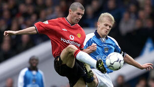 <p>Manchester United's Roy Keane and Manchester City's Alf-Inge Haaland in 2000. PA Photos: Phil Noble</p>