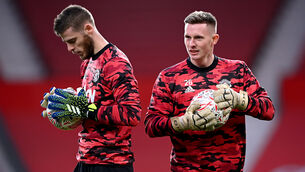 <p>Dean Henderson will play against Manchester City with David De Gea absent (Laurence Griffiths/PA)</p>