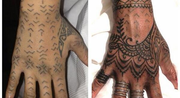 Rihanna sports new inking