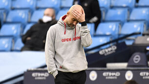 <p>Pep Guardiola saw Manchester City’s record winning run come to an end with derby defeat on Sunday. Picture: Peter Powell/PA</p>
