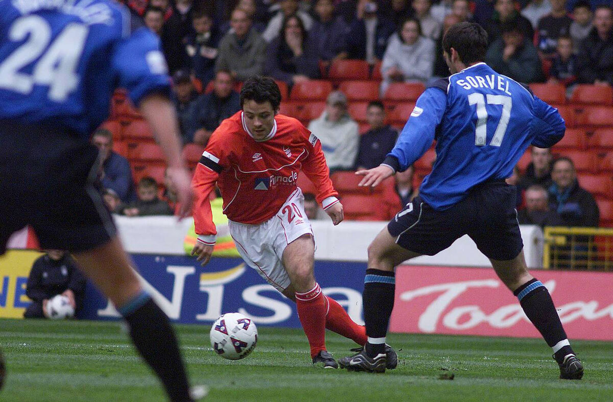 Nottingham Forrest's Andy Reid (left) passes Crew's Niel Sorvel during the Nationwide League Division One match in 2002. 