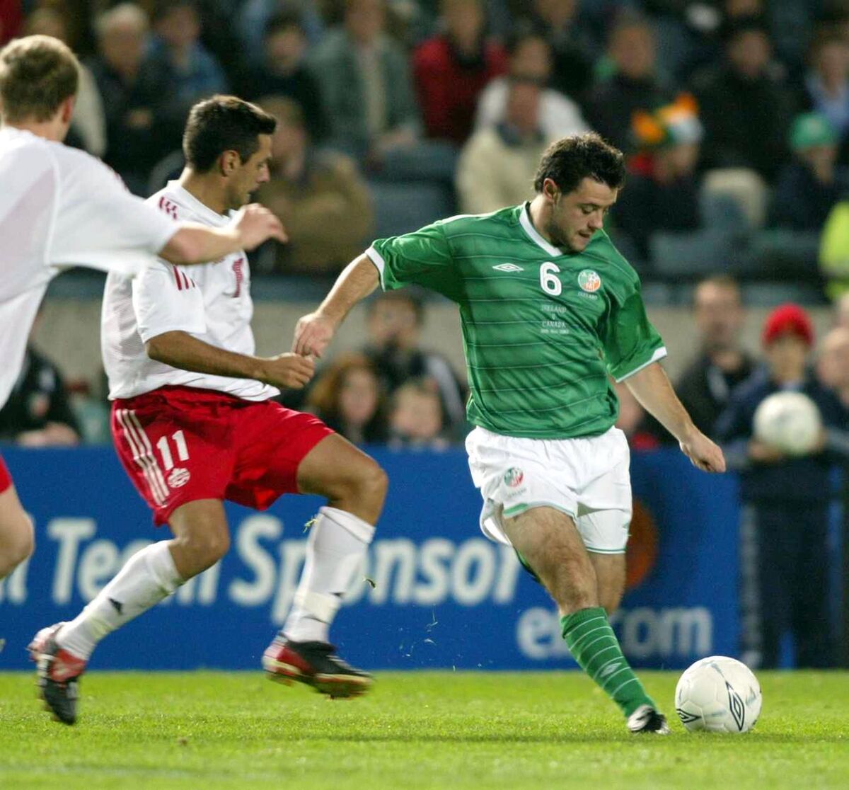 Andy Reid of Ireland and Ante Jazic of Canada during a 2003 international friendly.