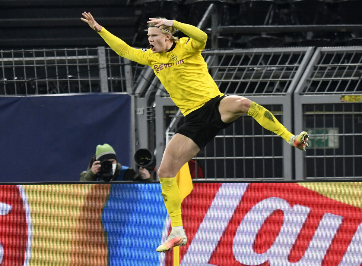 Erling Haaland celebrates scoring Borussia Dortmund's second goal against Sevilla on Tuesday. (Bernd Thissen/Pool via AP) Erling Haaland celebrates scoring Borussia Dortmund's second goal against Sevilla on Tuesday. (Bernd Thissen/Pool via AP)