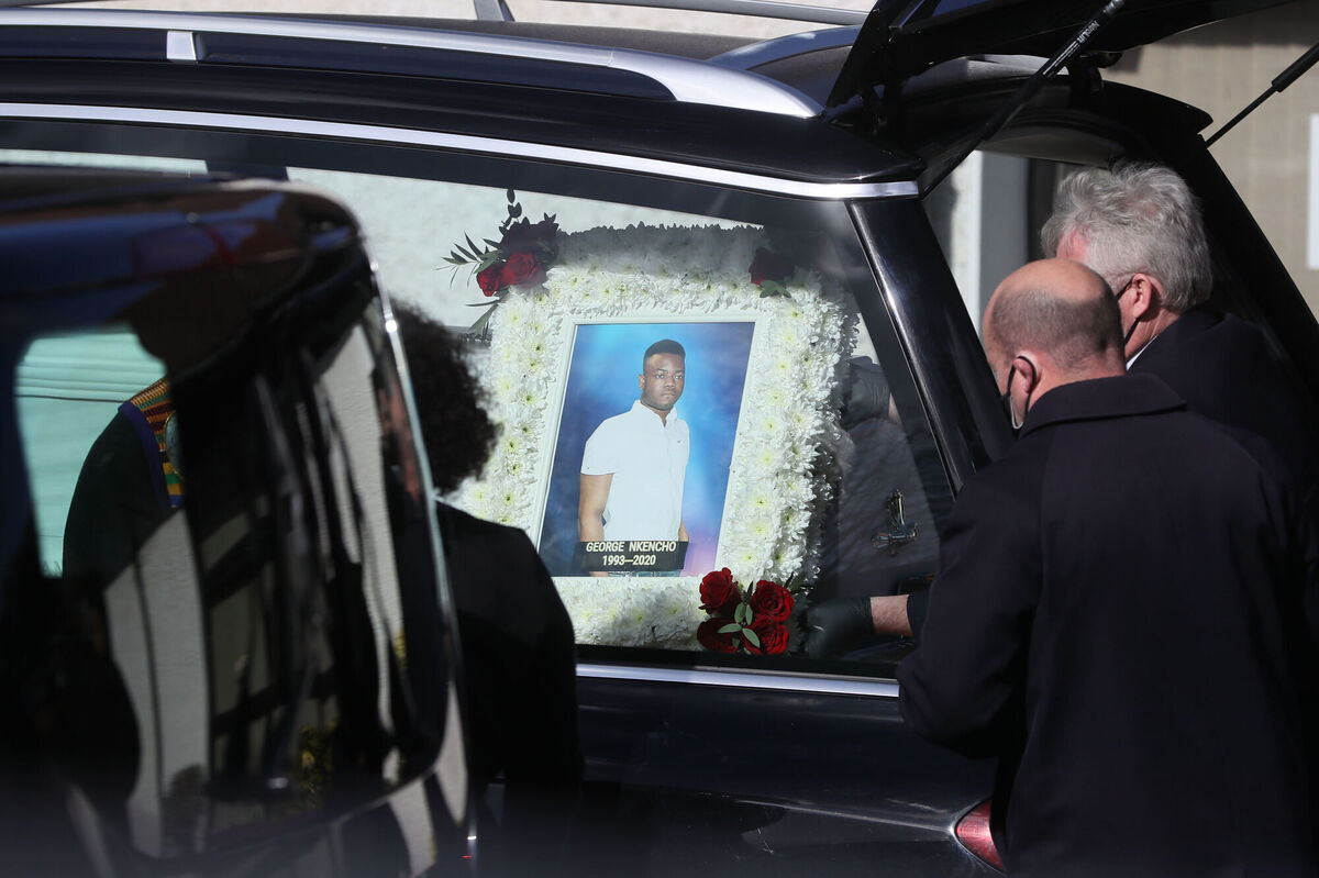 The coffin of George Nkencho, who was shot dead by gardai outside his Dublin home last December, is removed from the hearse on arrival at the Sacred Heart of Jesus Church, Huntstown, Dublin. Photo: Brian Lawless/PA Wire The coffin of George Nkencho, who was shot dead by gardai outside his Dublin home last December, is removed from the hearse on arrival at the Sacred Heart of Jesus Church, Huntstown, Dublin. Photo: Brian Lawless/PA Wire