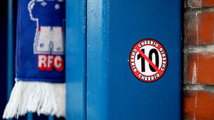 <p>A sticker outside Ibrox referencing Celtic's failed attempt to win 10 Scottish Premiership titles in a row. Picture: Jane Barlow/PA</p>