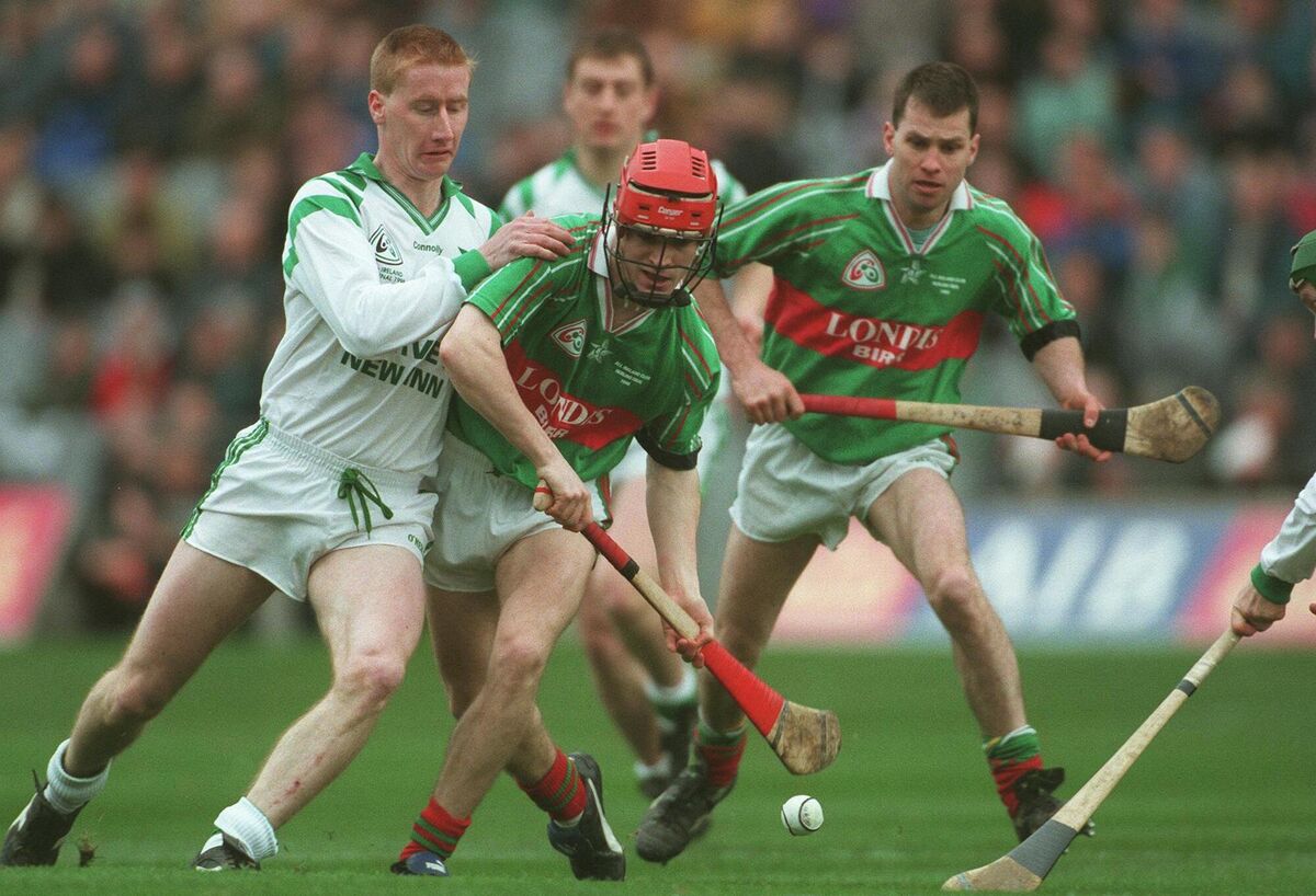 Paul Carrol of Birr goes past Gerry McGrath of Sarsfields in the 1998 All-Ireland club final. The Offaly side beat Anthony Daly's Clarecastle in the semi-final. Picture: INPHO/Brendan Healy