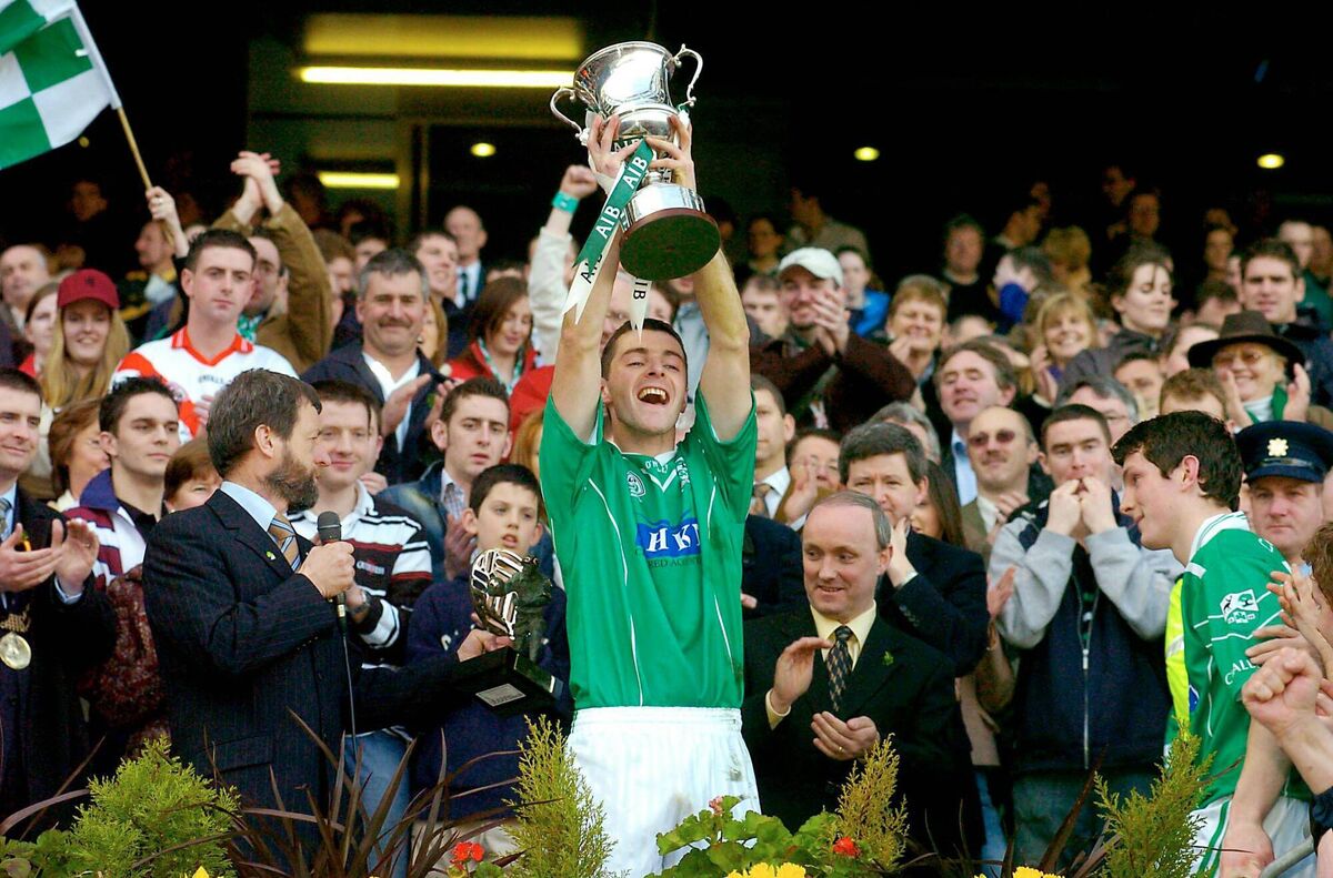 Caltra captain Noel Meehan lifts the Tommy Moore Cup after the 2004 club final win over An Gaeltacht 