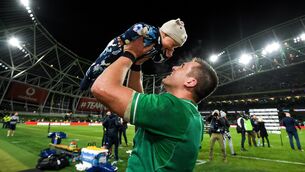 <p>Ireland's CJ Stander with his 6-month-old daughter Everli following the Guinness Six Nations Rugby Championship match between Ireland and Scotland at the Aviva Stadium in Dublin. </p>