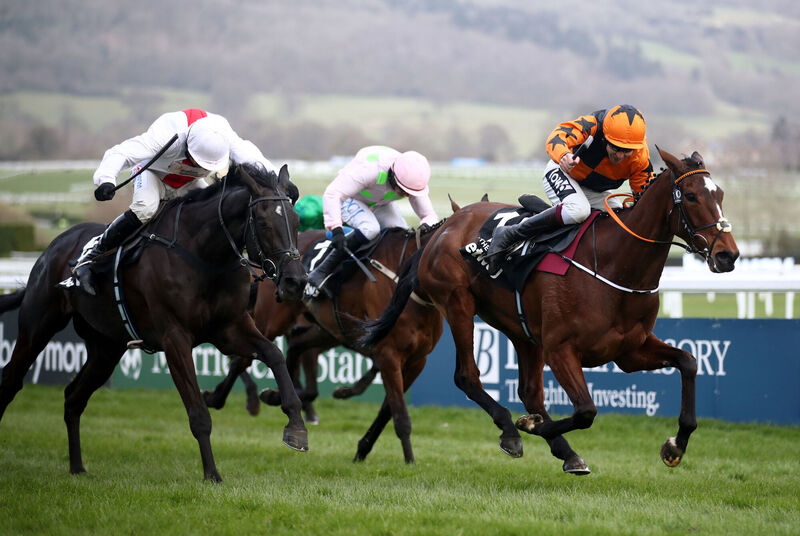 Put The Kettle On ridden by Aidan Coleman (right) on their way to winning the Betway Queen Mother Champion Chase on day two of the Cheltenham Festival at Cheltenham Racecourse. Picture: Tim Goode/PA