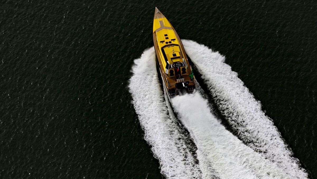 The record-breaking wave-piercing ThunderChild 11 roared past Cobh's waterfront. Picture: Dennis Horgan