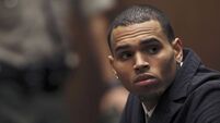Chris Brown claims he lost his virginity aged eight