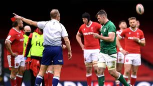 <p>Peter O'Mahony leaves the pitch having being shown a red card by Wayne Barnes during the Guinness Six Nations Rugby Championship game against Wales at the Principality Stadium in Cardiff. Photo by Ben Evans/Sportsfile</p>