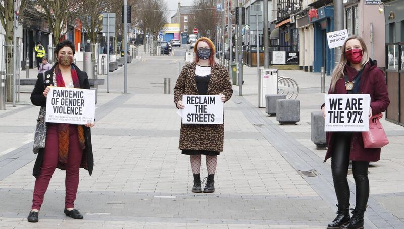 Stefanie Dicroce, Claire Moroney and Aislinn O'Keeffe at the Limerick protest against gender-based violence. Picture: Liam Burke/Press 22